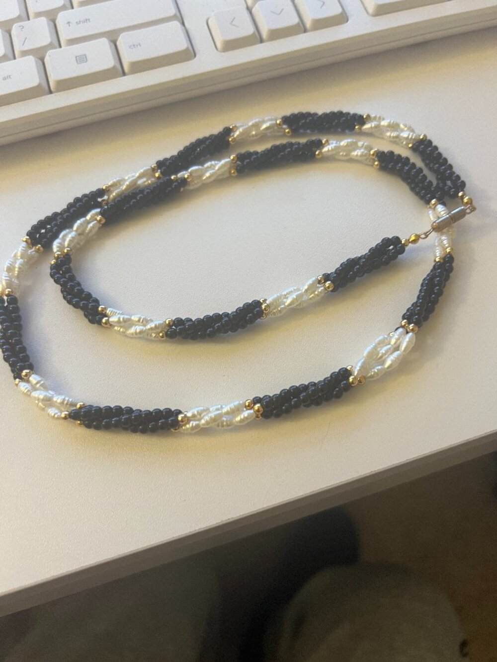 Black & White Beaded Necklace with Gold‑Tone Spacers